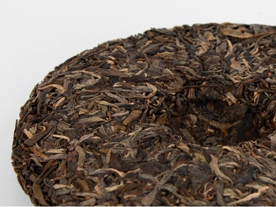 QIAN JIA ZHAI SHENG PUERH ARBATA 1